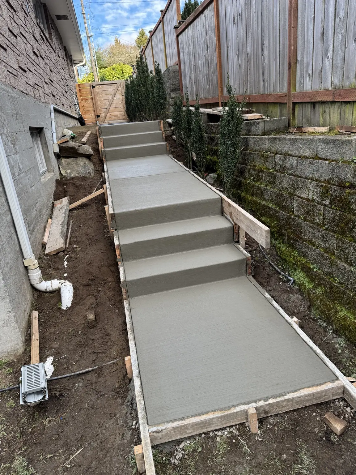 Freshly finished concrete steps and walkway