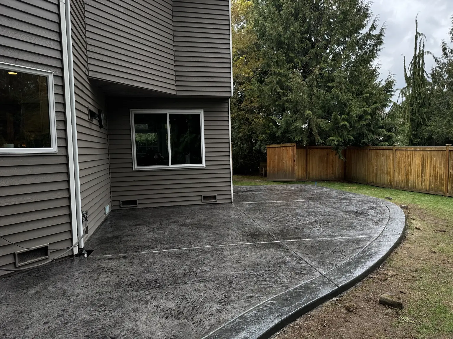 Curved stamped concrete patio